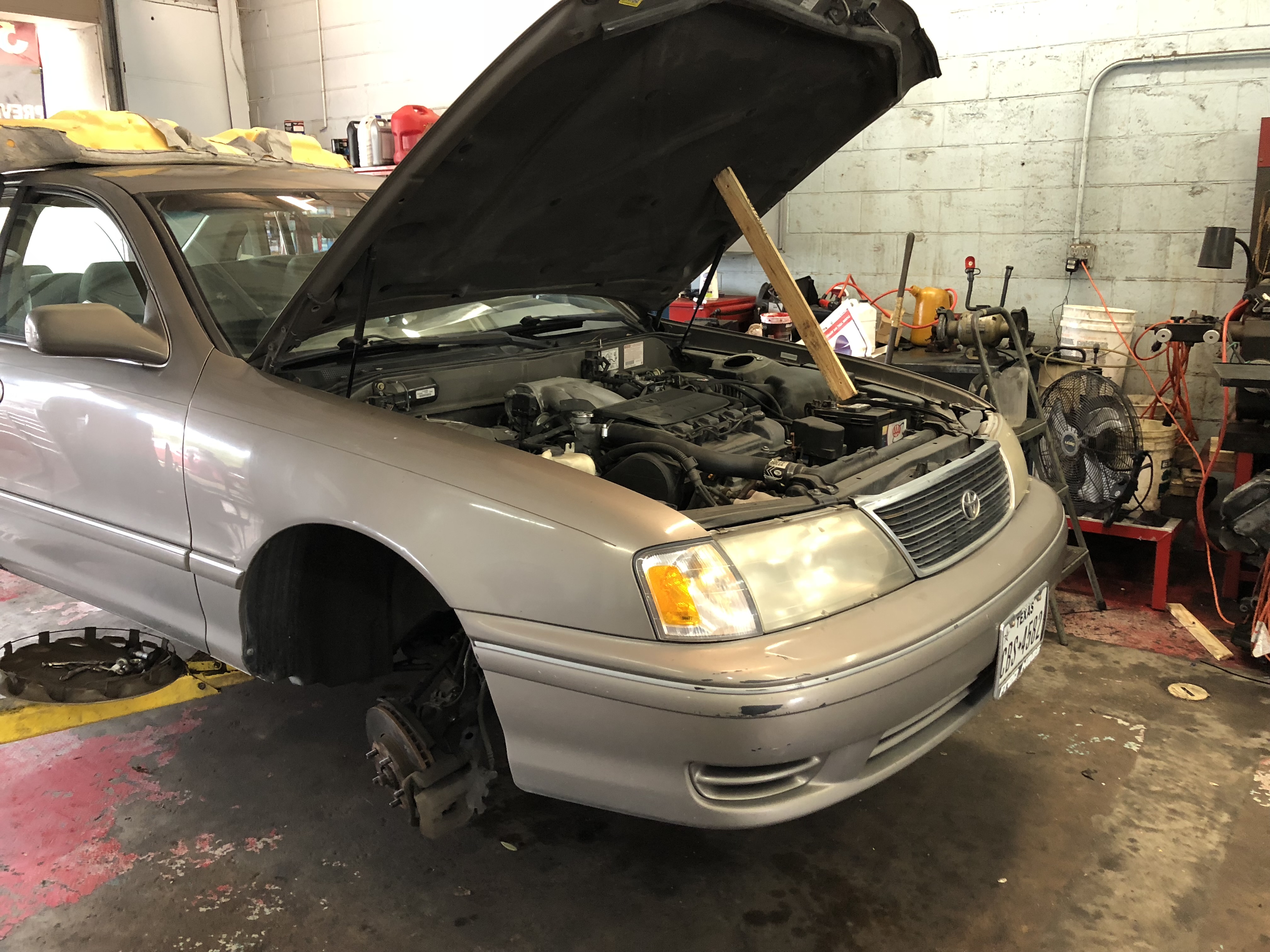 Toyota Avalon getting brake service at Lonestar Auto Repair